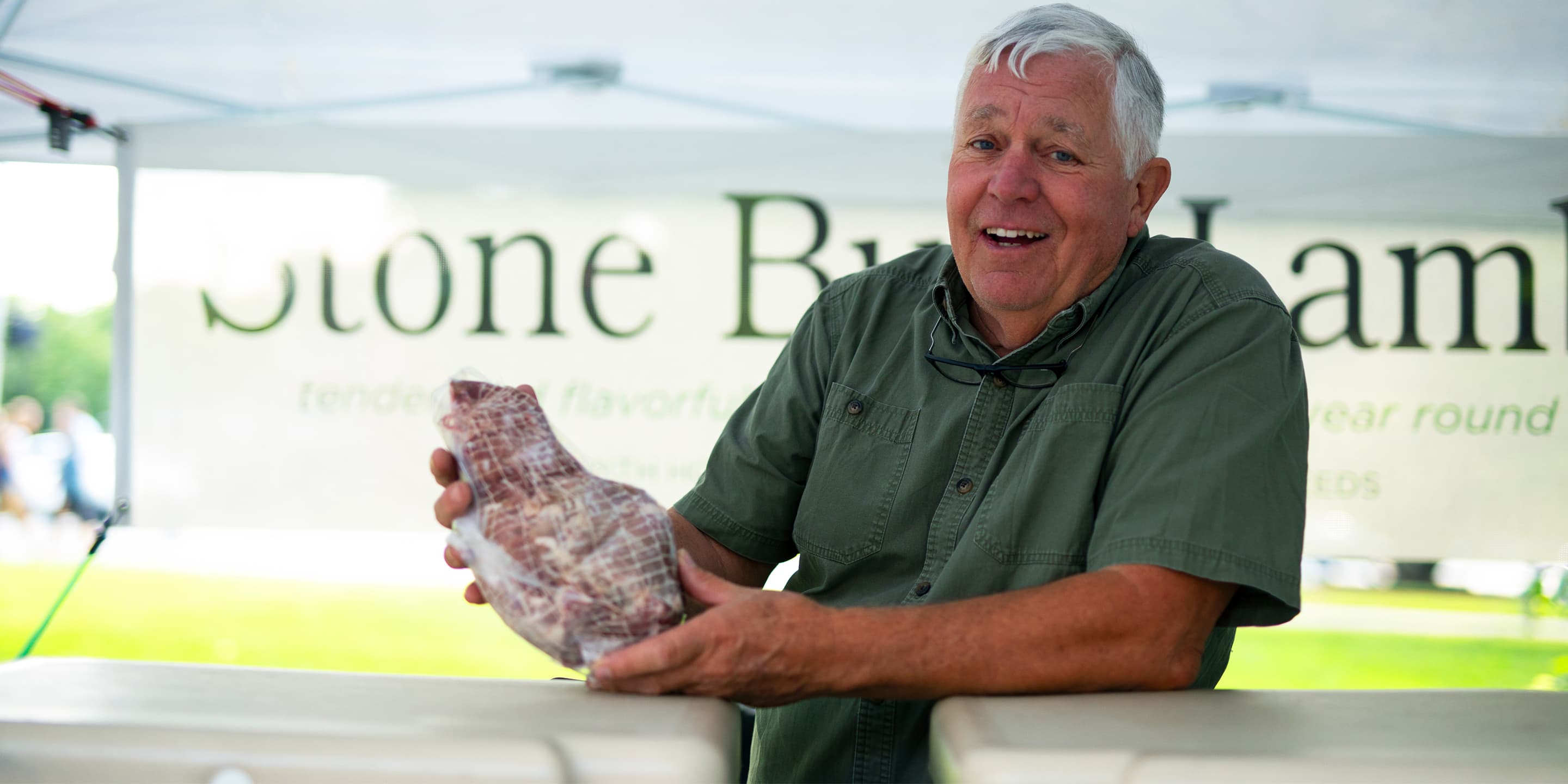 man holding raw meat